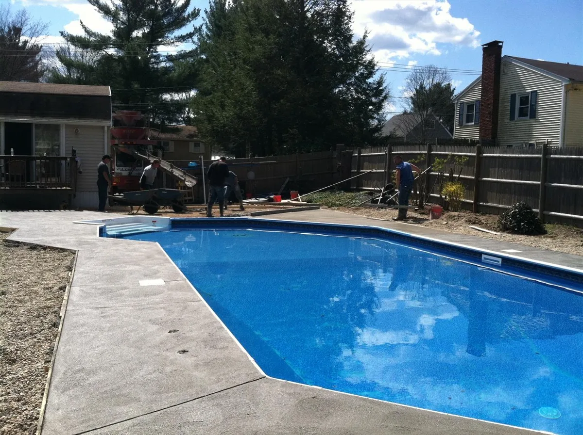 Pool Pro's Inc. crew installing an in-ground pool